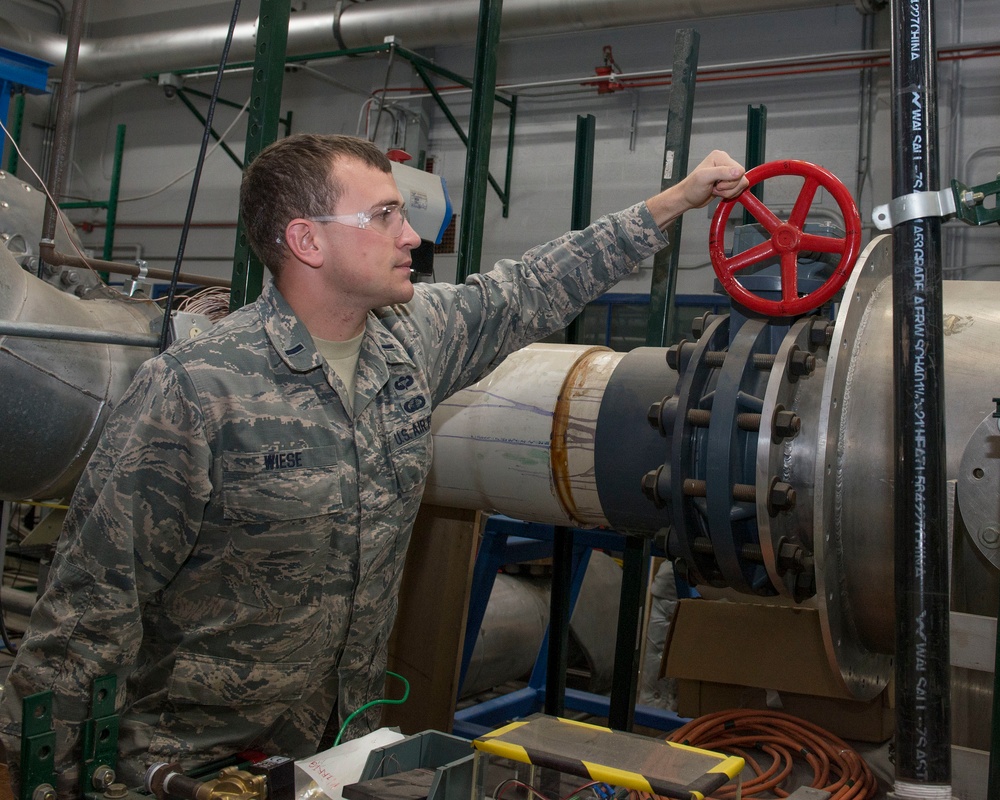 AFRL turbomachinery research engineer conducts velocity testing of a gas turbine engine