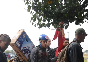 Santa’s ruck march spreads holiday cheer