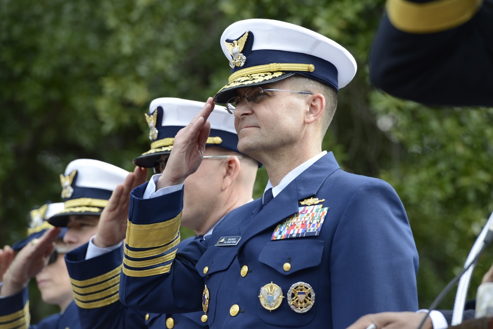 Admiral Charles D. Michel gives salute during Veterans Day Parade