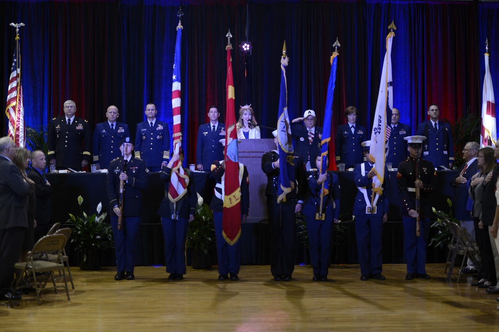 Military members stand for colors during Mobile Veteran Day Honors Luncheon