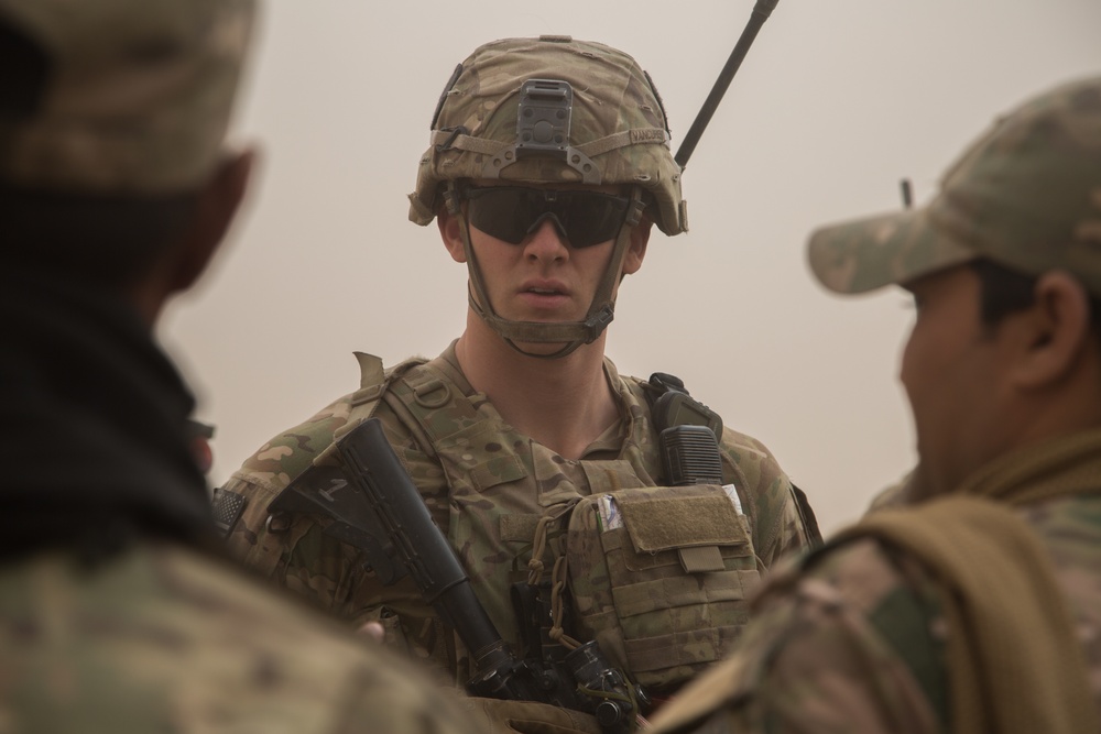 U.S. Soldiers conduct foot patrol to establish rapport