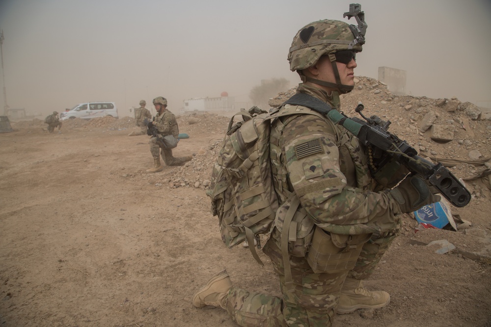 U.S. Soldiers conduct foot patrol to establish rapport