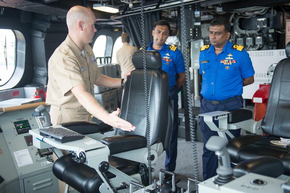 USS Coronado (LCS 4) Commanding Officer gives a tour to members of the Sri Lanka Navy.