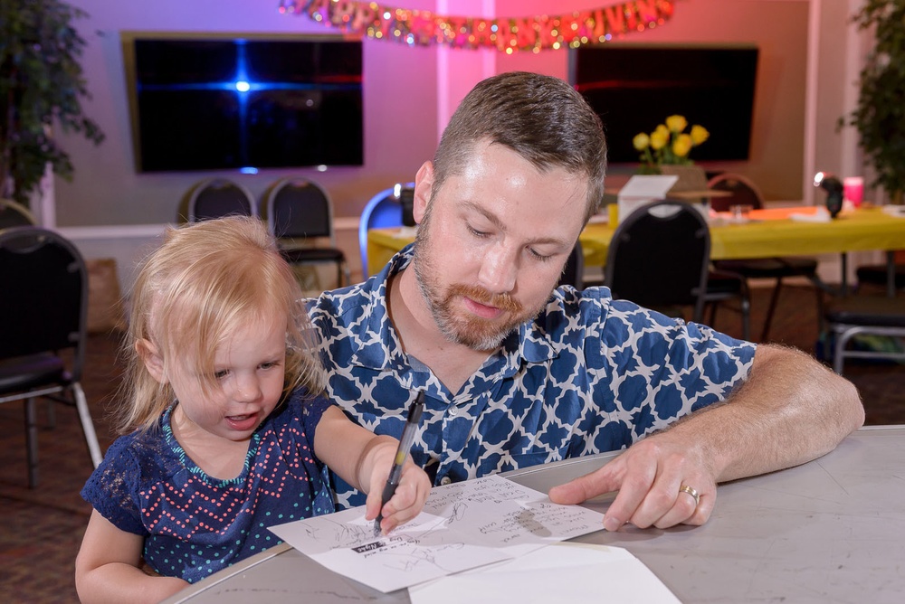 Families prepare holiday packages for deployed Airmen