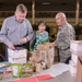 Families prepare holiday packages for deployed Airmen