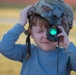 A Child Peers Through an Optic During Marne Week