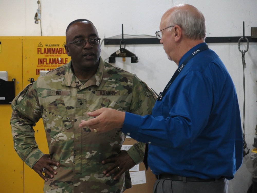 Brig. Gen. Richard Dix, Commanding General of Joint Munitions Command speaks with Mr. Ed Averill, Deputy to the Commander of Letterkenny Munitions Center, during his tour of operations vital to Army Readiness.