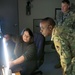 Letterkenny Munitions Center employee, Ms. Lisa Michael, demonstrates X-Ray capabilities to Brig. Gen. Richard Dix, Commanding General of Joint Munitions Command during his visit.