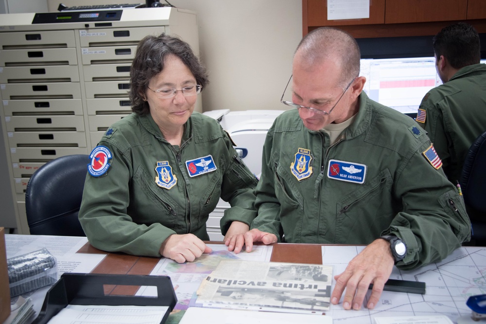 Long-time weather reconnaissance crewmembers retire