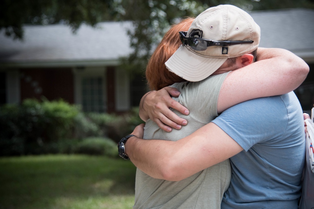 Airmen help one another after Louisiana flooding