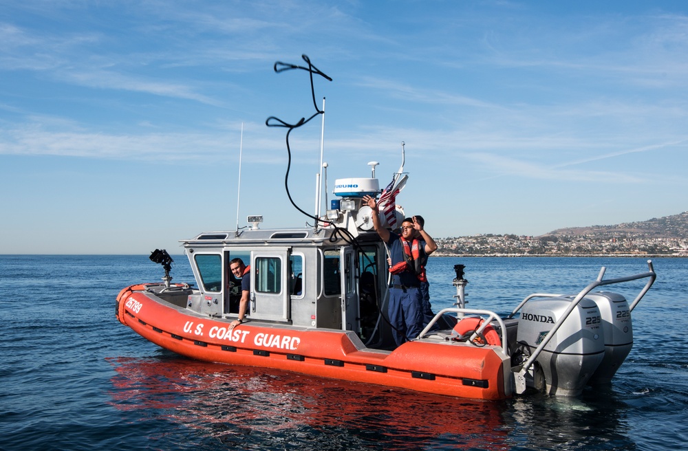 Coast Guard members conduct disabled vessel assist training