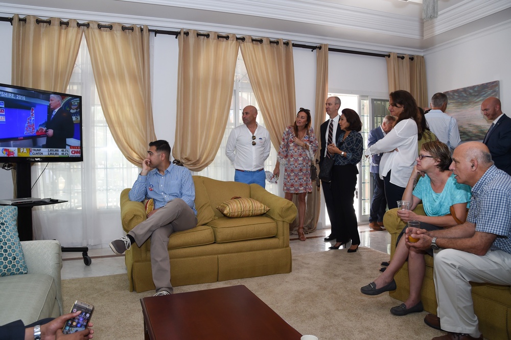 Guests of the U.S. Ambassador to Djibouti gather at his home during an Election Day breakfast