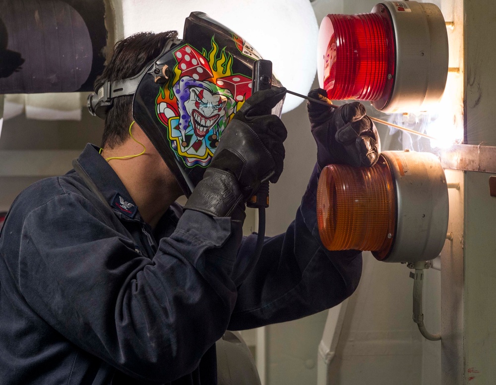 USS Wayne E. Meyer Sailors Welding