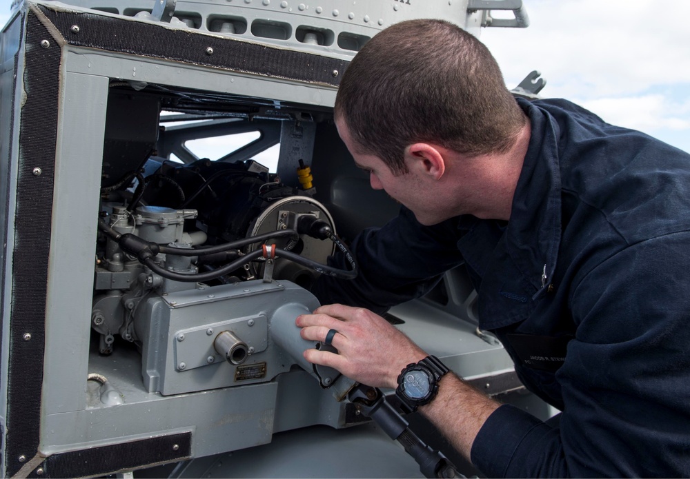 USS Wayne E. Meyer Performs Maintenance on the Close-In-Weapon System