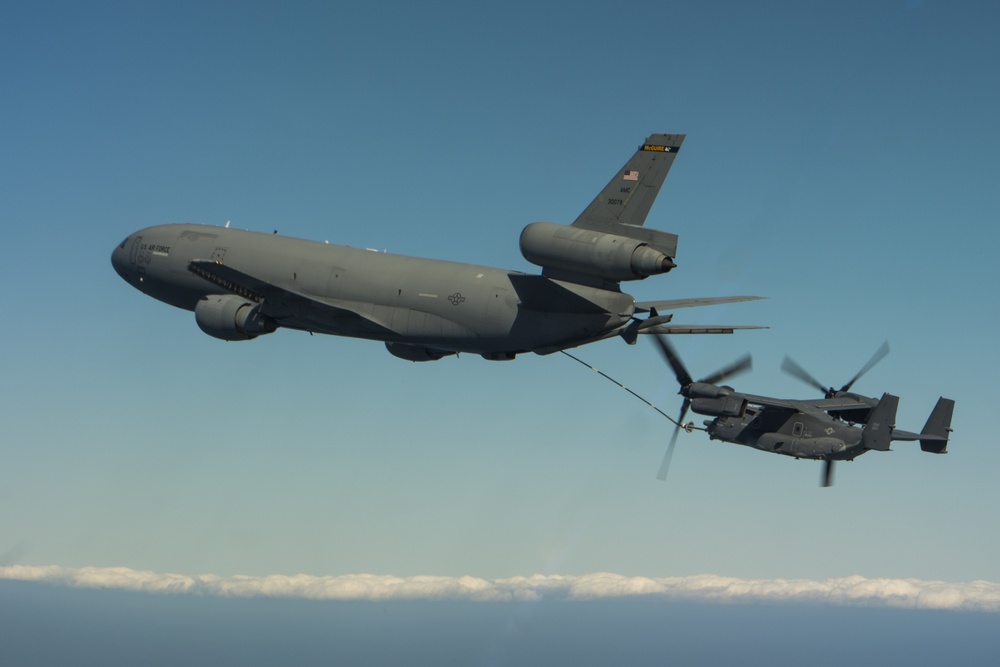 KC-10 Extender refuels CV-22 Ospreys