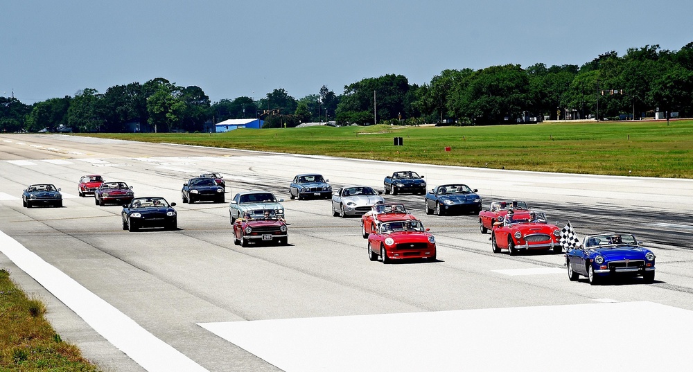 British cars race down runway