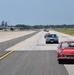 British cars race down runway