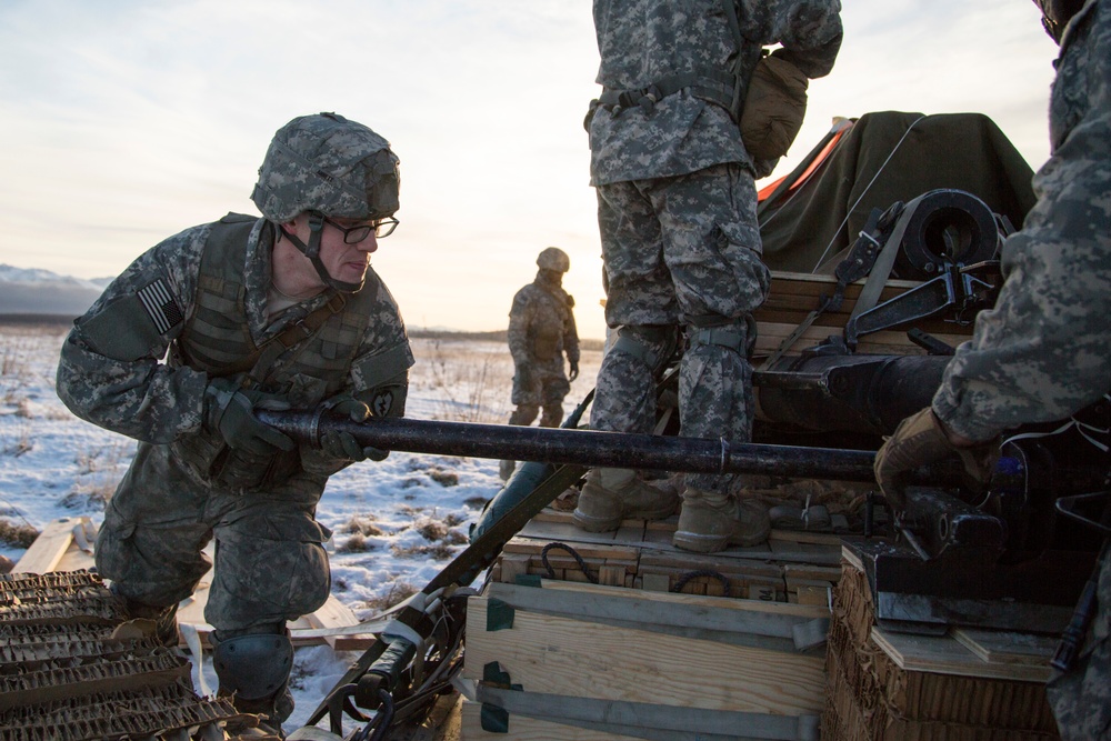 2-377 PFAR paratroopers fire the 105 mm howitzer