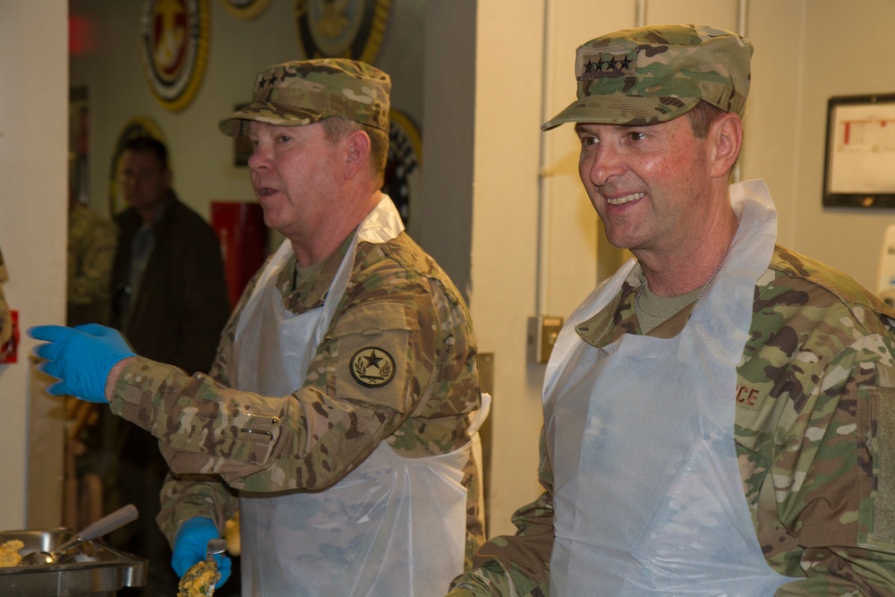Gen. Joseph Lengyel, and Airforce, Maj. Gen. John Nichols serve Thanksgiving lunch