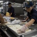 USS Zumwalt Sailors prepare lunch
