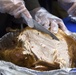 Camp Kinser service members serve Thanksgiving meal at Okinawa homeless shelter