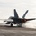 An F/A-18C Hornet launches from the flight deck of USS Nimitz An F/A-18C Hornet launches from the flight deck of USS Nimitz