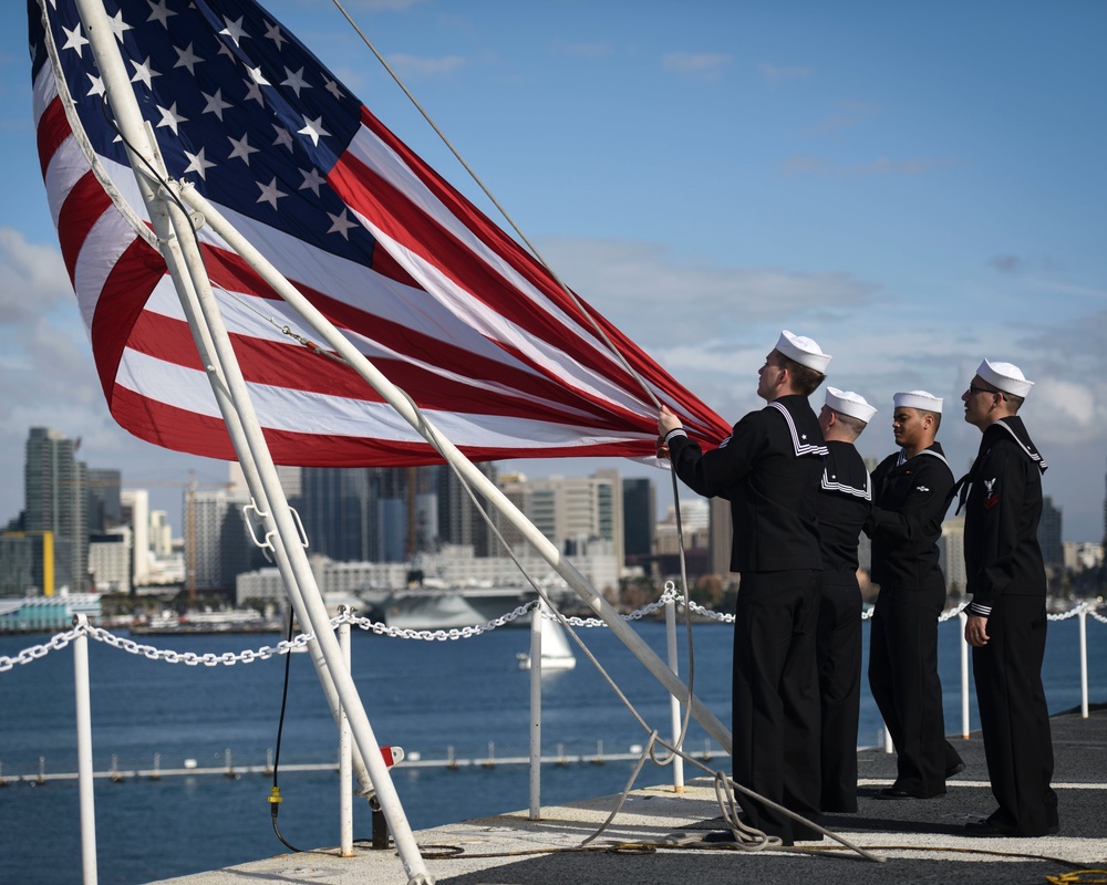 Nimitz Sailors raise Ensign over San Diego
