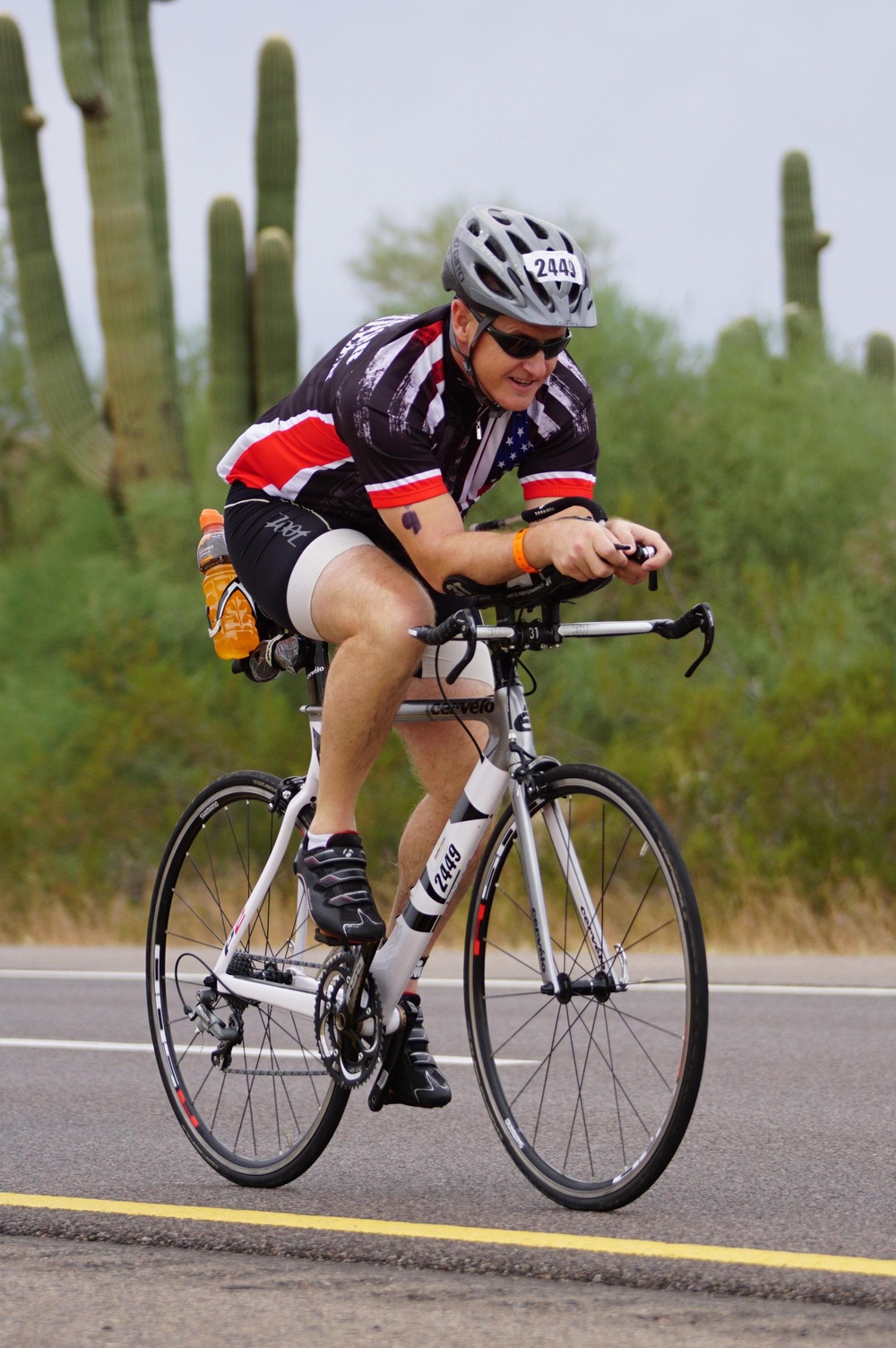 1st Sgt. Mitter rides during the cycling portion of the Ironman