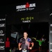 1st Sgt. Mitter crosses the finish line of the Ironman
