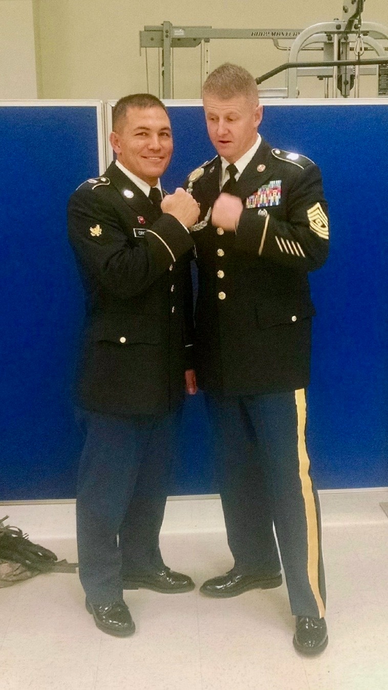 1st Mitter poses with Spc. Michael Orozco, winner of the 2016 United States Army Reserve Best Warrior competition