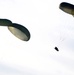 Spartan paratroopers jump, fire artillery