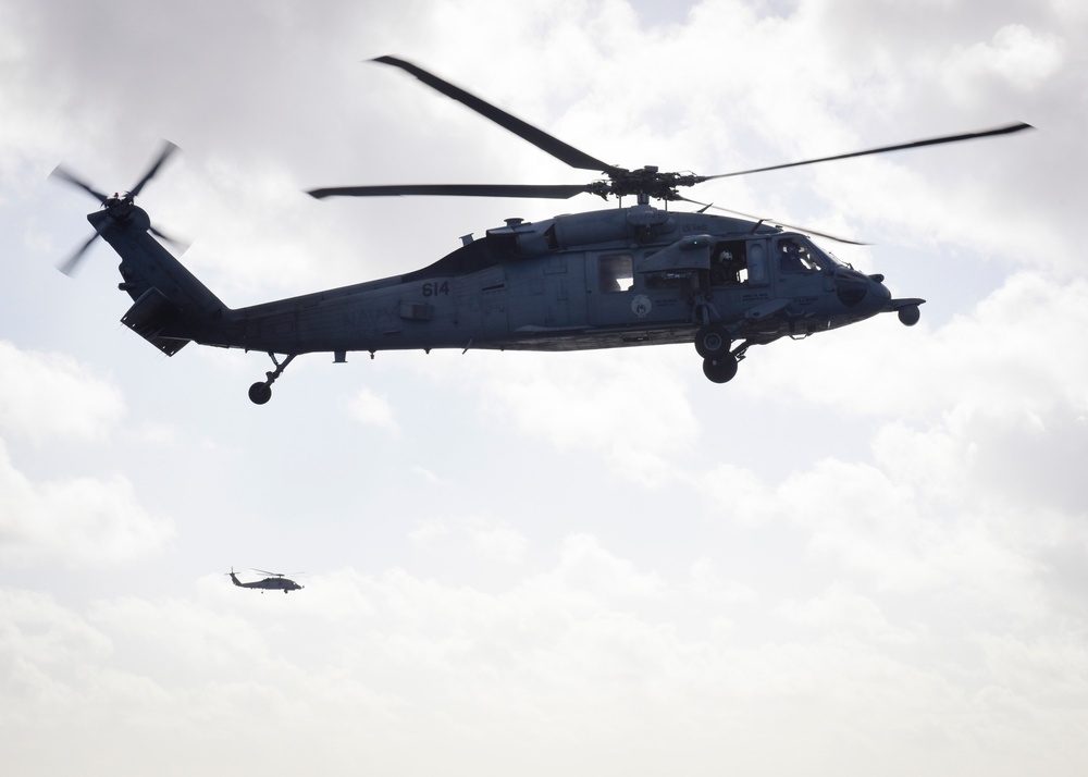 An MH-60S Sea Hawk prepares to land on board USS Nimitz