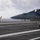 Sailor directs an F/A-18C on Nimitz's flight deck