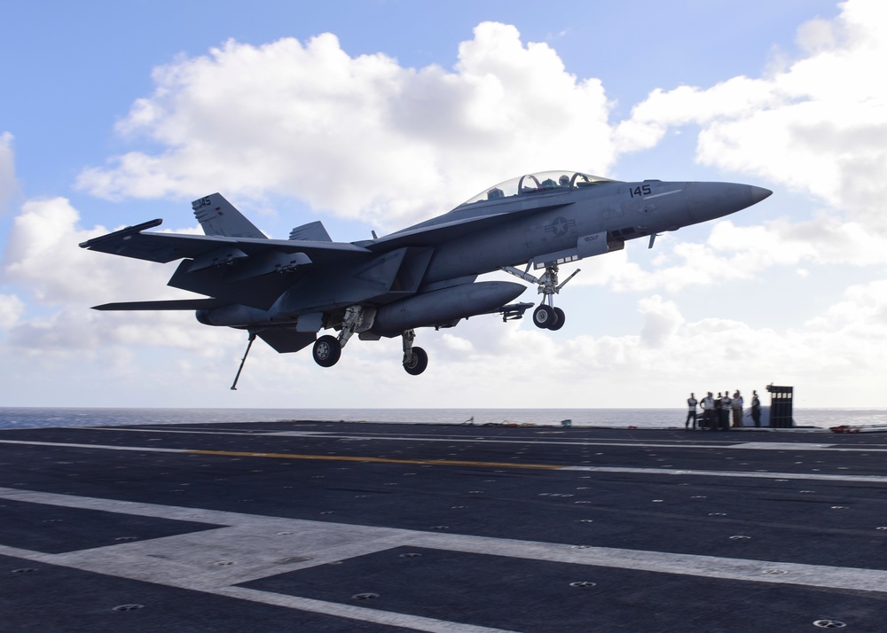 An F/A-18C Hornet lands on board USS Nimitz