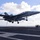 An F/A-18C Hornet lands on board USS Nimitz