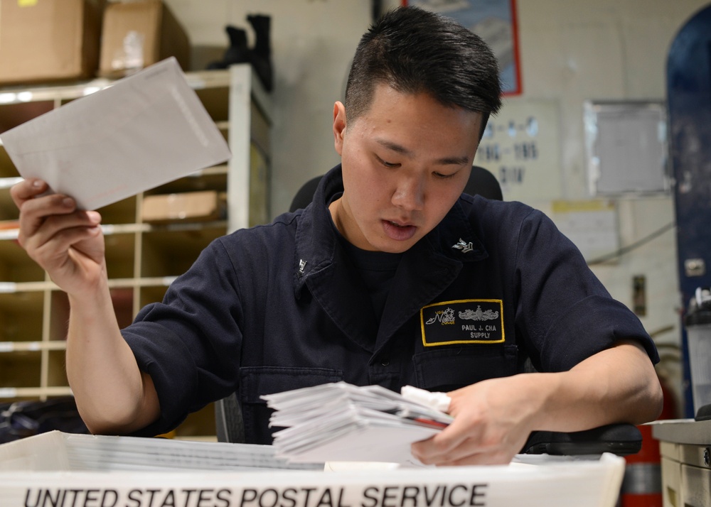 Sailor sorts mail