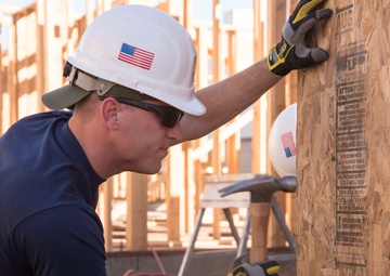 Members of Coast Guard Station Los Angeles volunteer with Habitat for Humanity