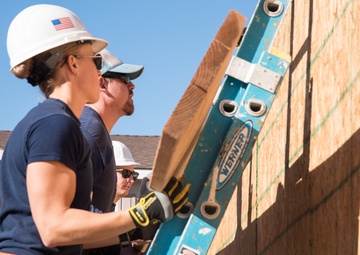 Members of Coast Guard Station Los Angeles volunteer with Habitat for Humanity