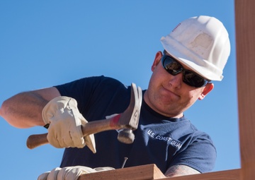 Members of Coast Guard Station Los Angeles volunteer with Habitat for Humanity