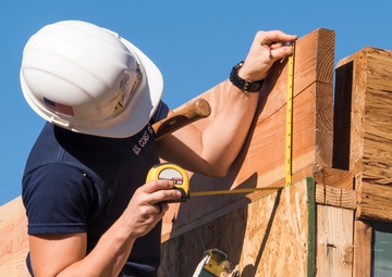Members of Coast Guard Station Los Angeles volunteer with Habitat for Humanity