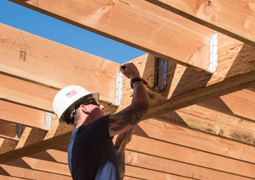 Members of Coast Guard Station Los Angeles volunteer with Habitat for Humanity