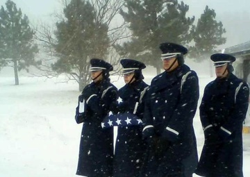 Despite winter weather, Airmen honor veteran