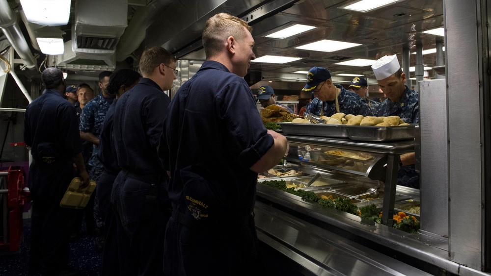 Sailors enjoy Thanksgiving dinner aboard USS Zumwalt (DDG 1000)