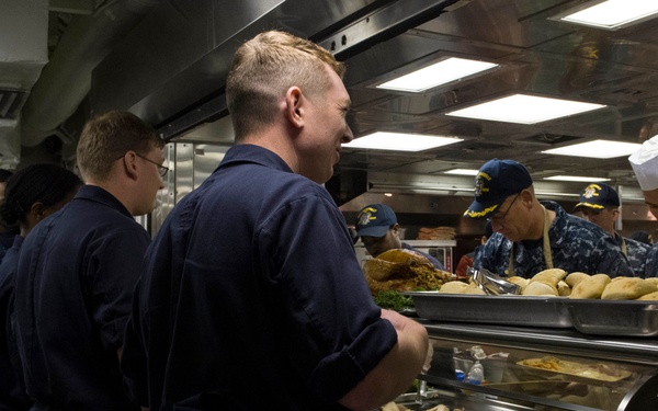Sailors enjoy Thanksgiving dinner aboard USS Zumwalt (DDG 1000)