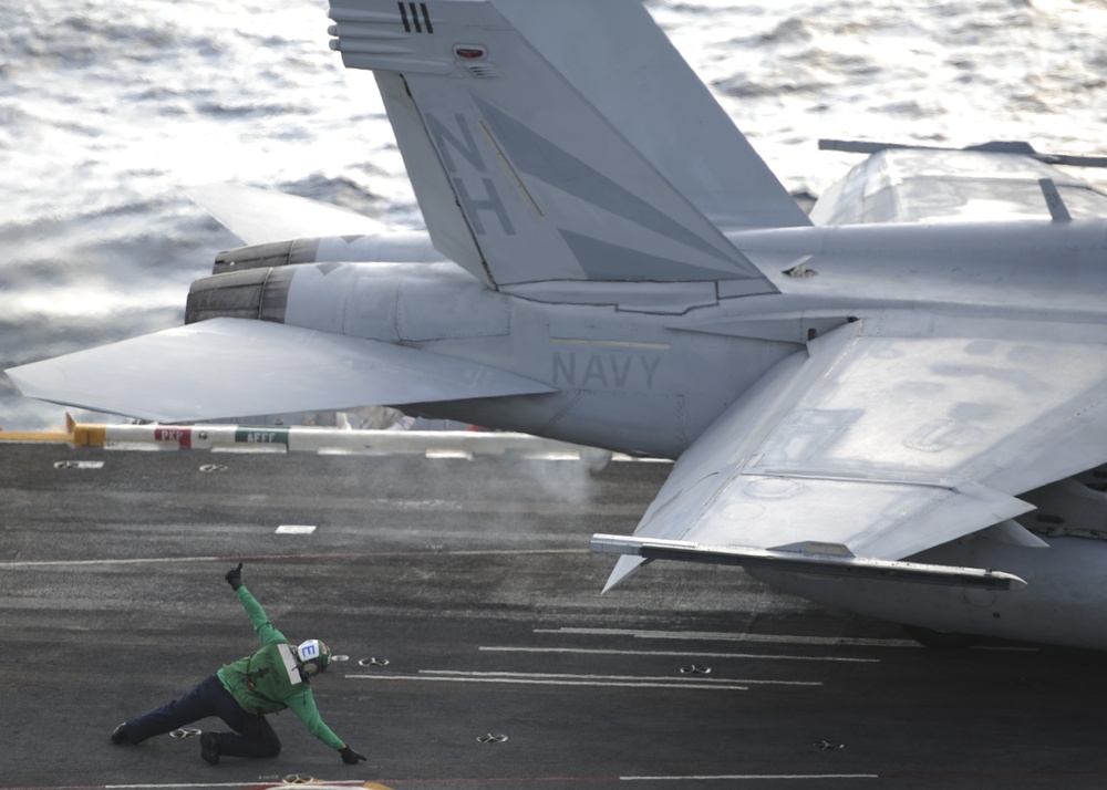 Sailor prepares to launch F/A-18 F Super Hornet