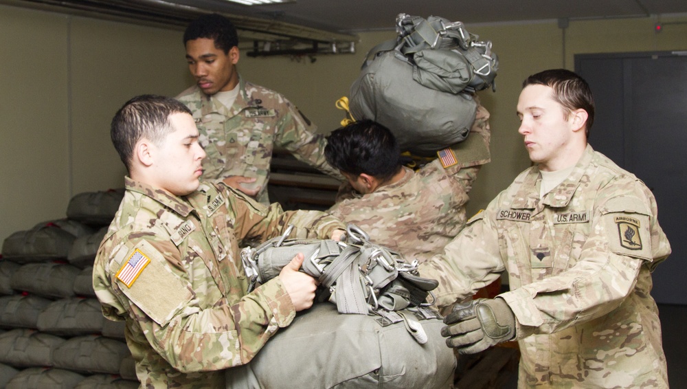 Parachute riggers establish readiness one parachute at a time