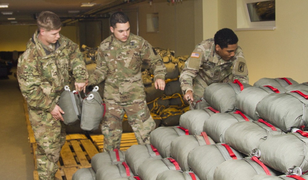 Parachute riggers establish readiness one parachute at a time