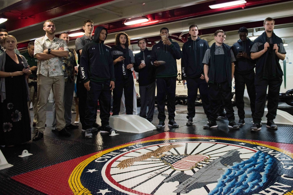 College Basketball Teams Tour USS Stennis during Pearl Harbor 75th Commemoration