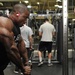 Airman performs tricep rope pulldown