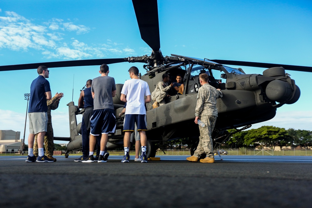 College basketball teams get taste of military aircraft during 75th Anniversary of Pearl Harbor